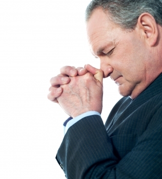 man praying for long life
